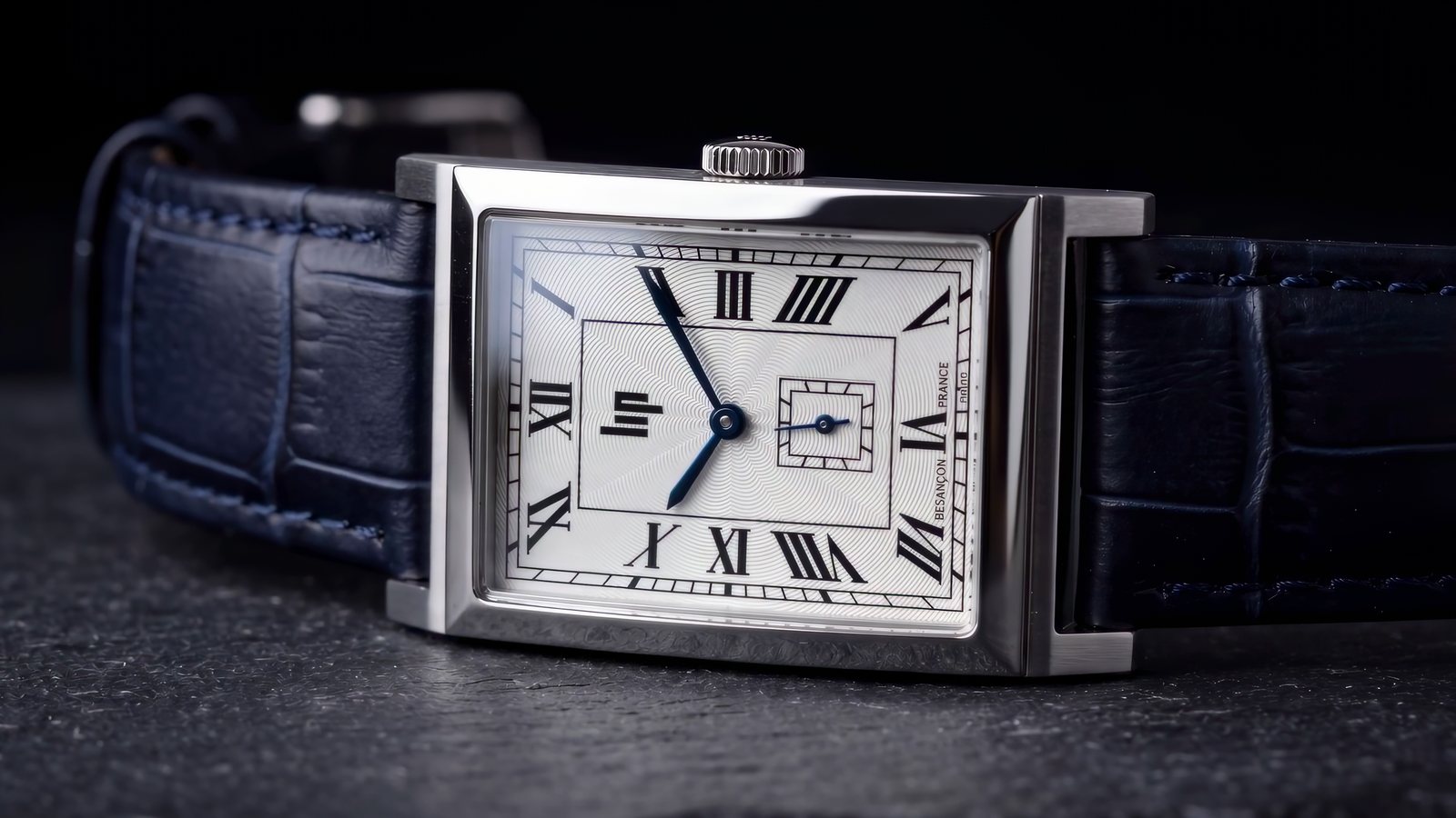 The LIP Besançon watch on dark slate, a frame of the 4K film